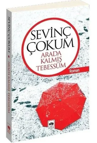 Arada Kalmış Tebessüm