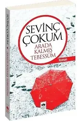 Arada Kalmış Tebessüm